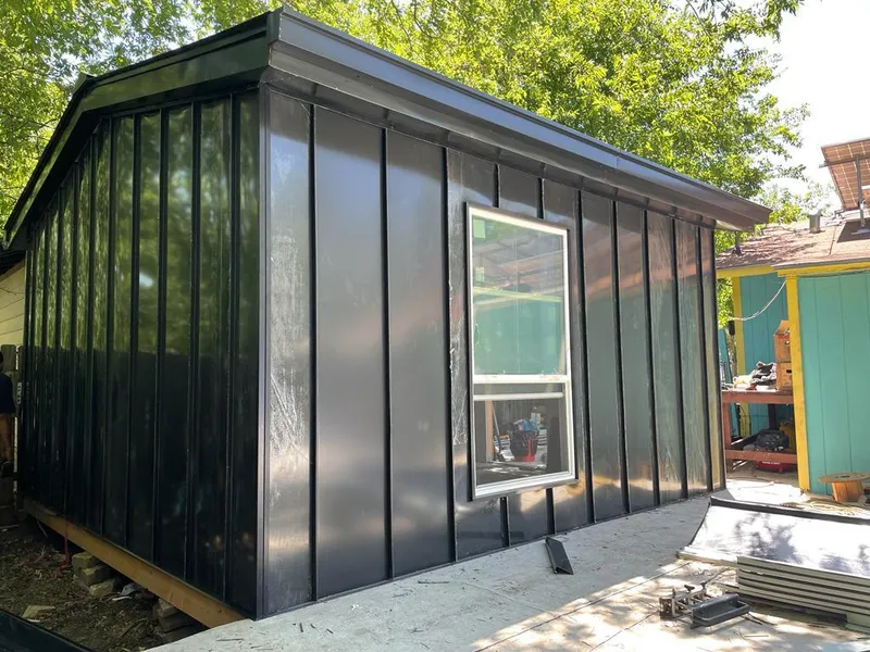 Black standing seam metal wall panels for Metal Roof Installation in Whispering Pines